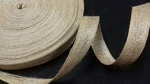 Jute ribbon 2.5 cm, with lurex, silver, 50 m per roll.