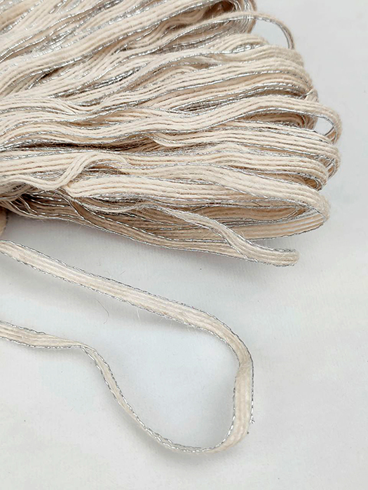 Jute ribbon 0.8cm, white-silver, 100 m per roll.