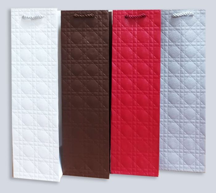 Paper bag 11*38*11 cm, Elegant with embossing, 12 pcs per pack.