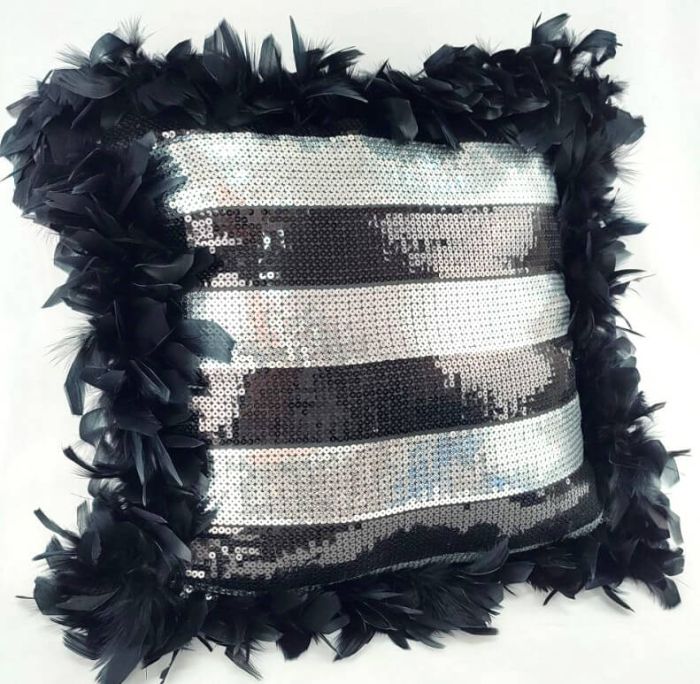 Interior cushion in sequins with feathers