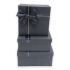 A set of 3 dark gray square gift boxes
