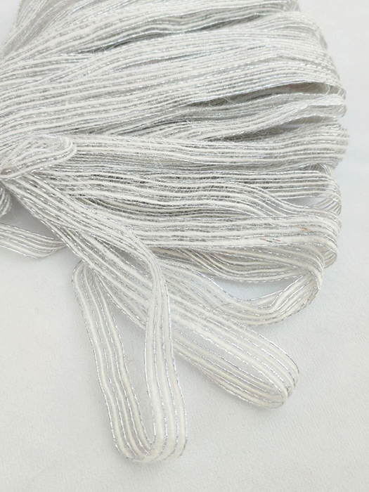 Jute ribbon 0.6cm, white with gold border, 100 m per roll.