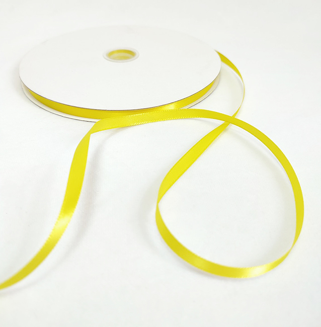 Polyester tape. A2-059; width 0.6 cm; 91.44 m in steering wheel.