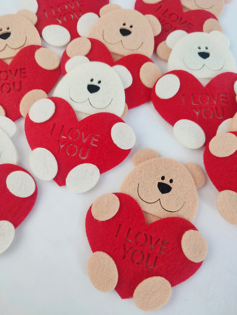 A decorative felt product Bear cub with a heart, 10 cm, 10 pcs in a pack